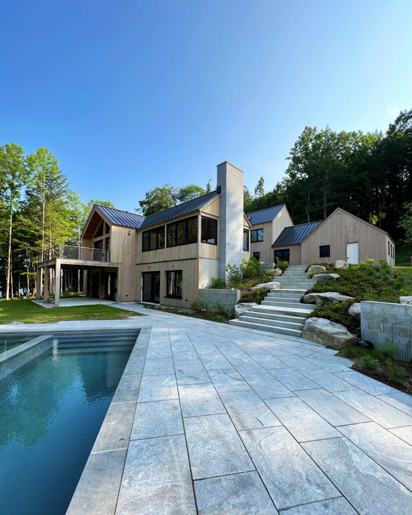 Home that utilizes a geothermal heat pump for heating and cooling.