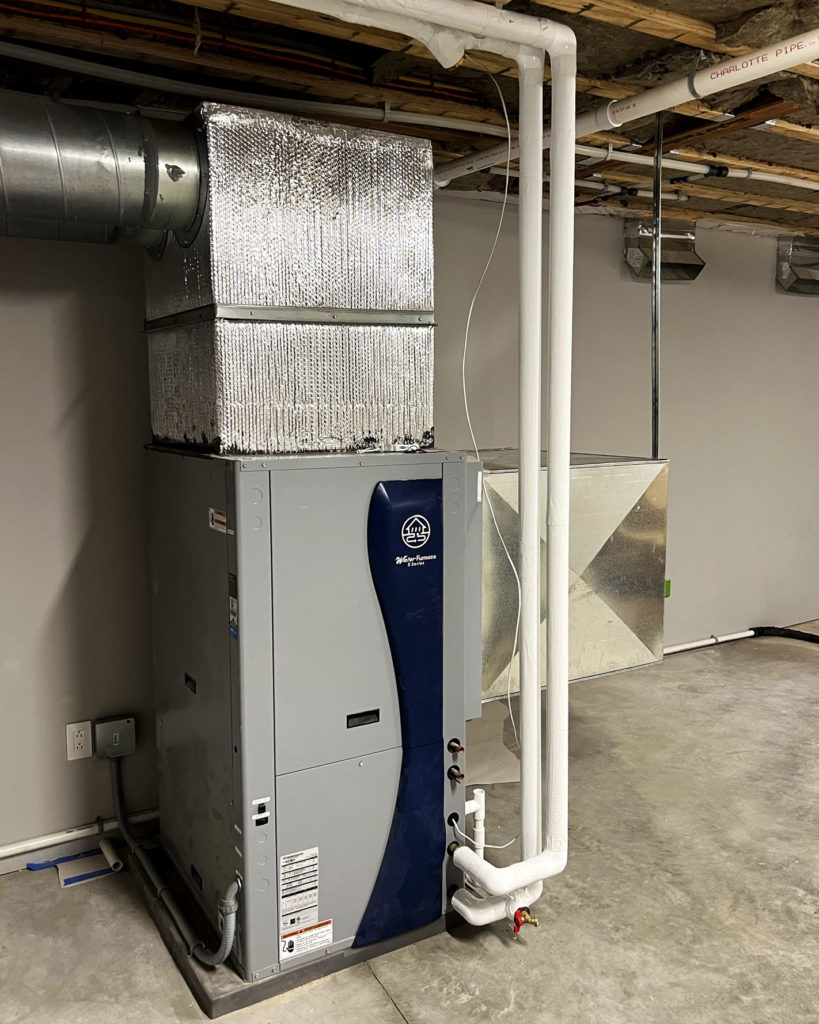 Water Furnace geothermal system to provide hydronic heating and cooling.