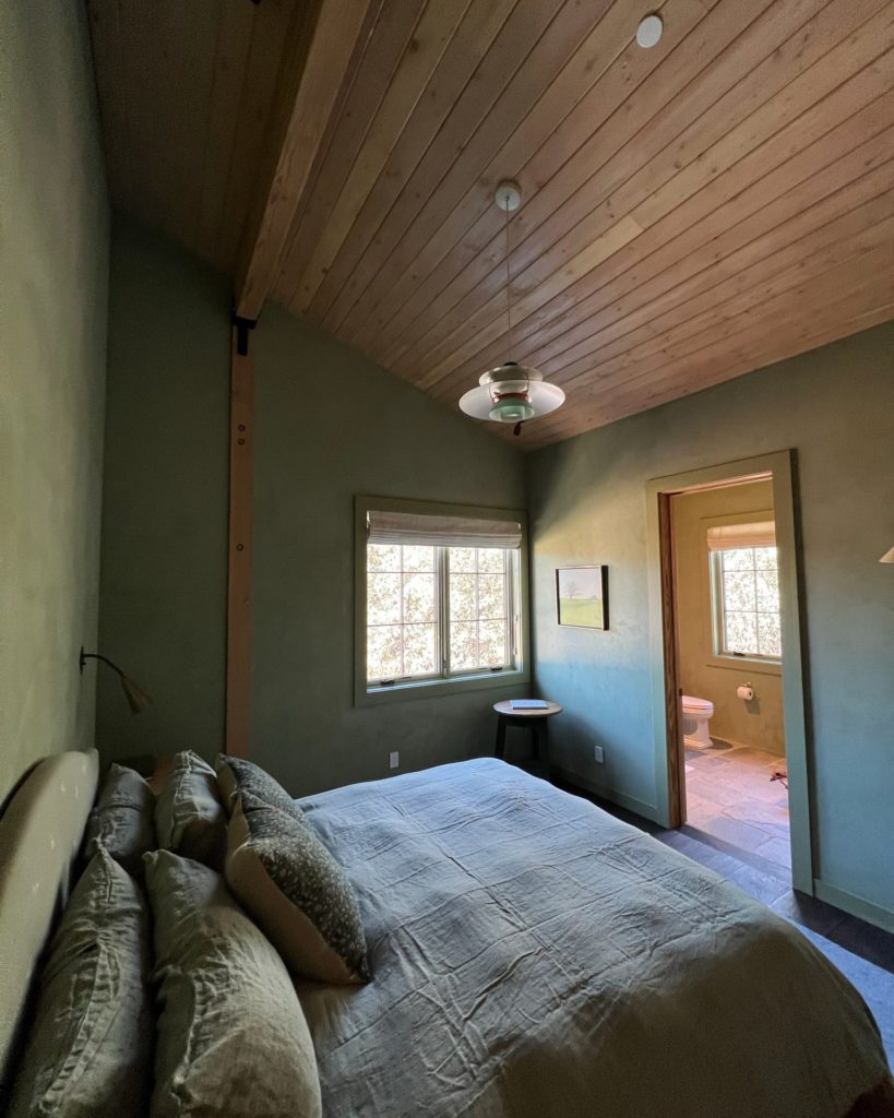 Bedroom in ranch house that has a radiant floor.