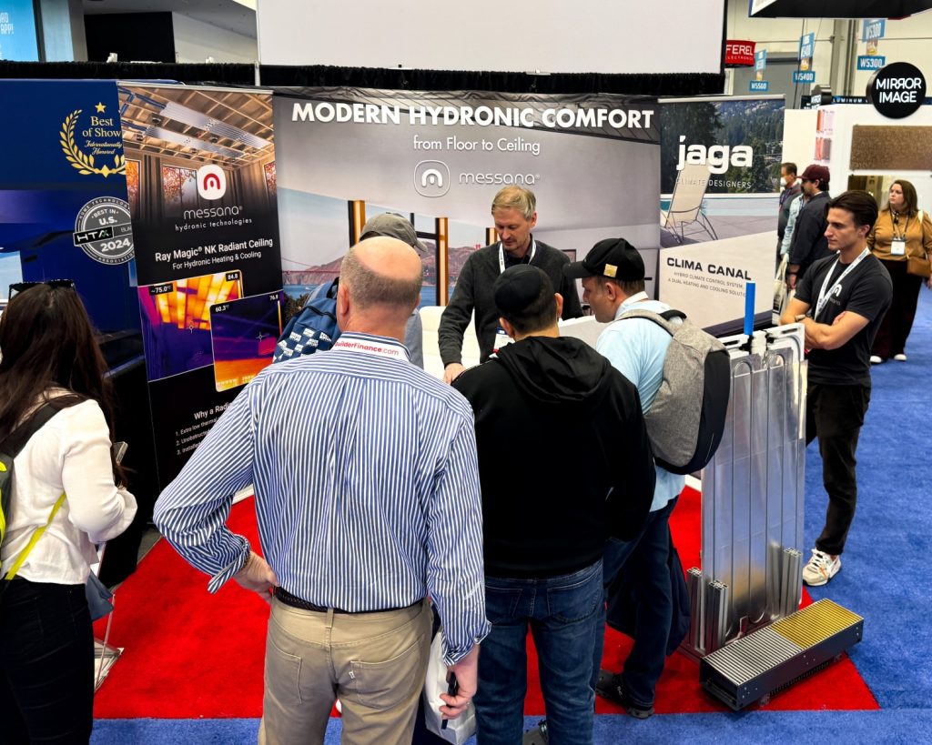 Francesco discussing radiant cooling and heating at the Messana Booth.