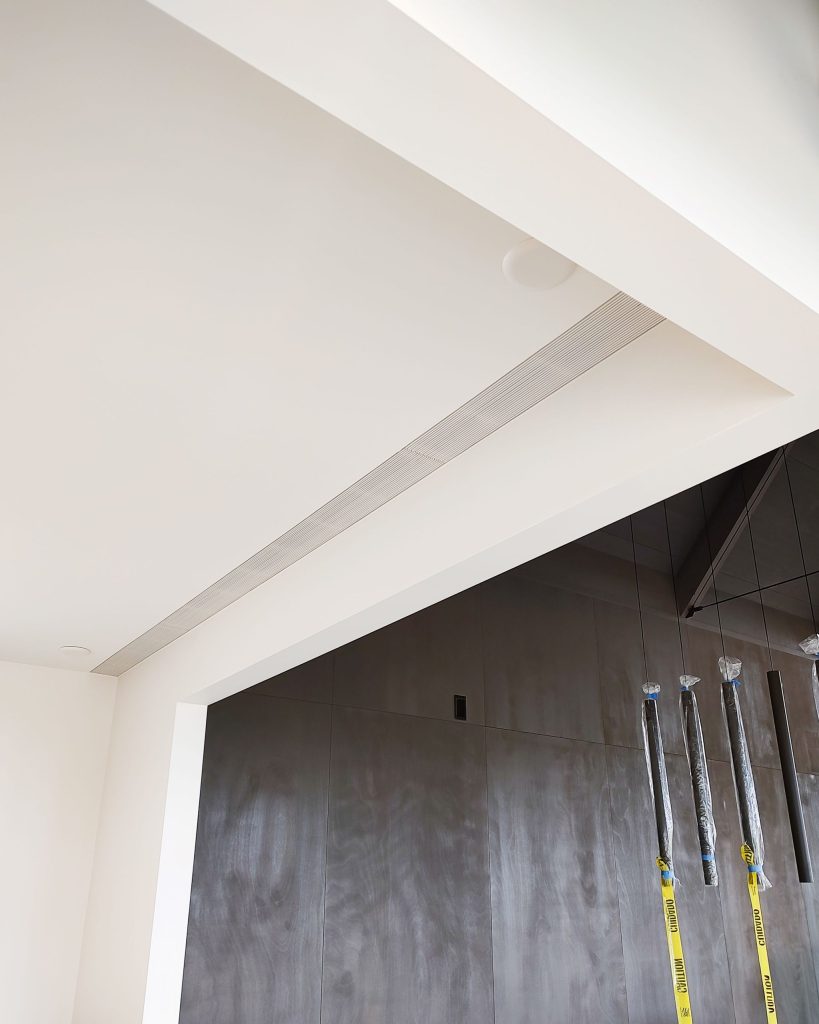 Jaga Briza fan coil unit grilles in ceiling, managed via Messana Controls mBox10.