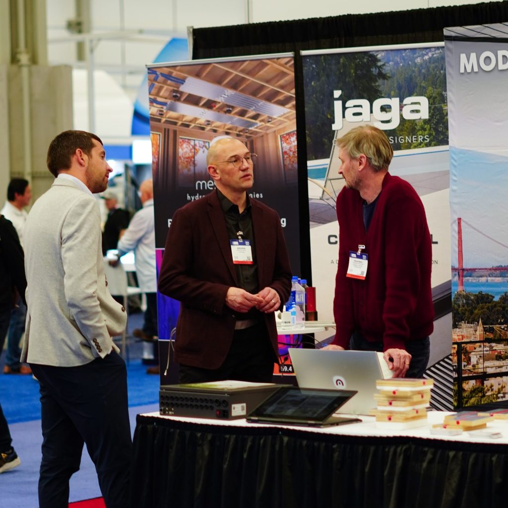 Francesco discussing modern hydronic solutions with attendees at the International Builders Show.