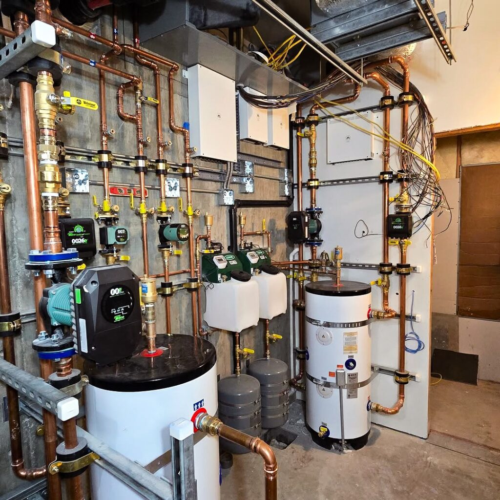 Messana Controls managing hydronic heating and cooling via a radiant surface and Jaga fan coil units.